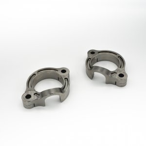 A picture of two Triumph 1200 exhaust flanges